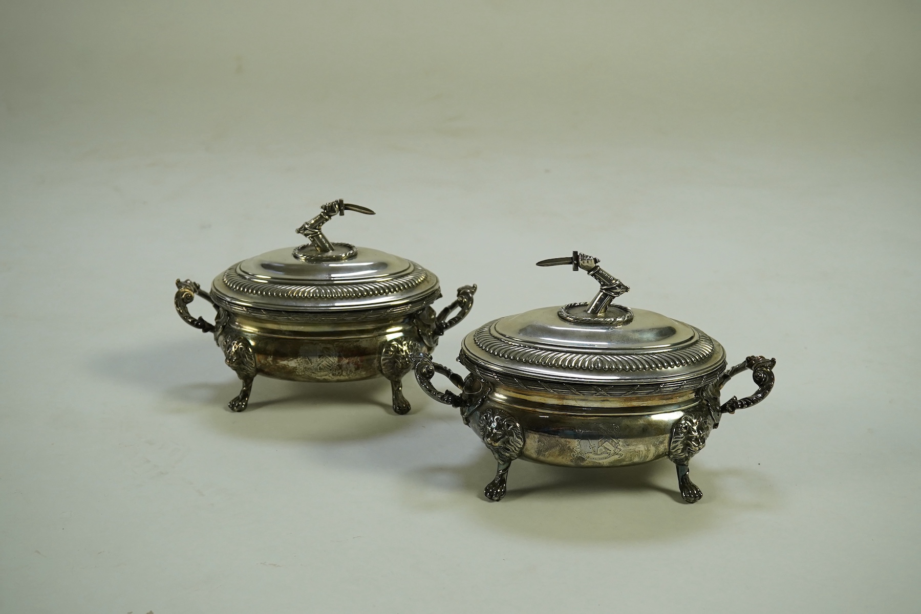 A pair of George III silver two handled oval sauce tureens and covers, by Robert Garrard I